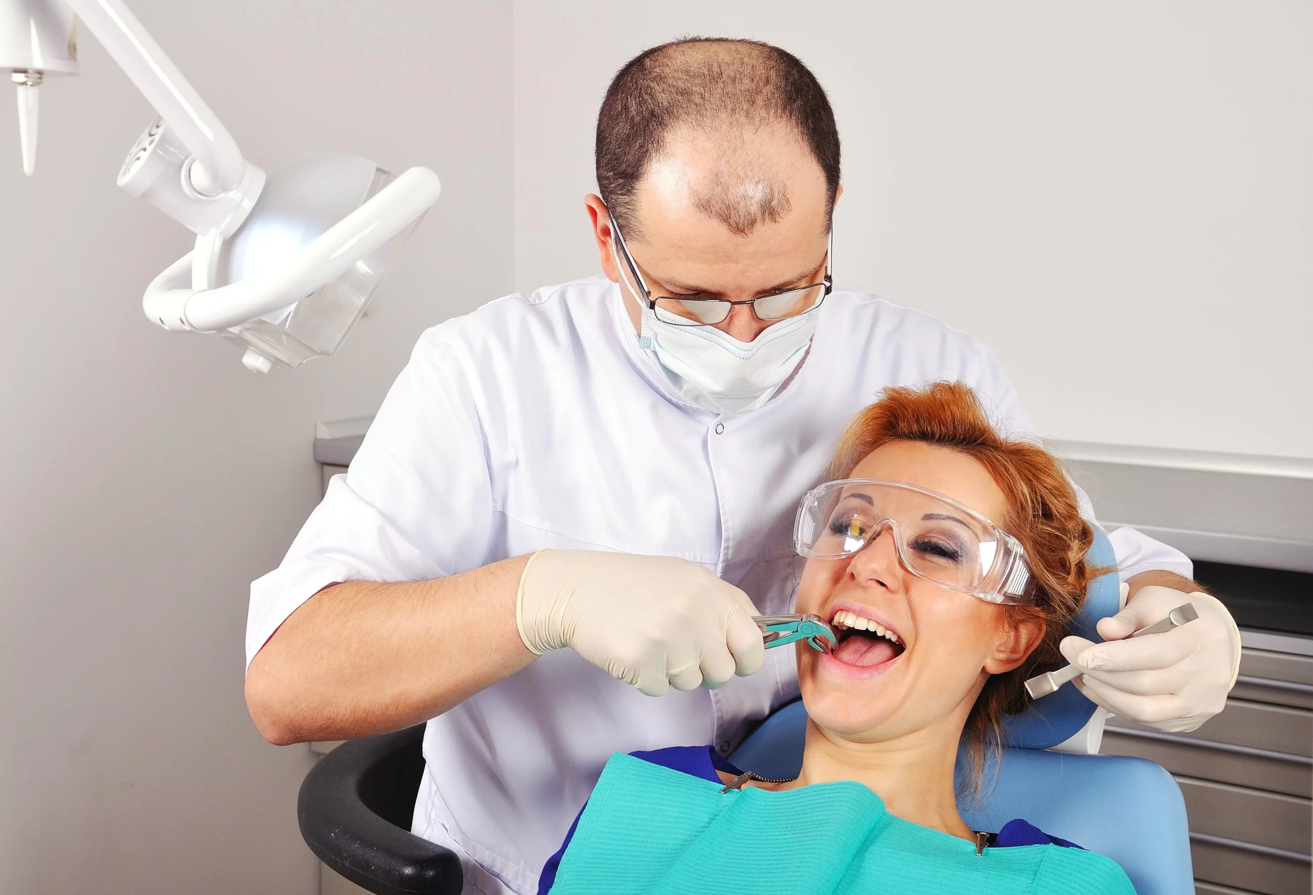 Dental-Tooth-Extraction Full Dental Implants Procedure at McClane Dentistry